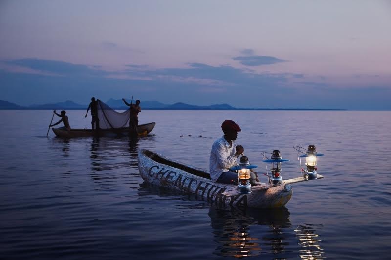 Fishermen on Lake Malawi at dusk.