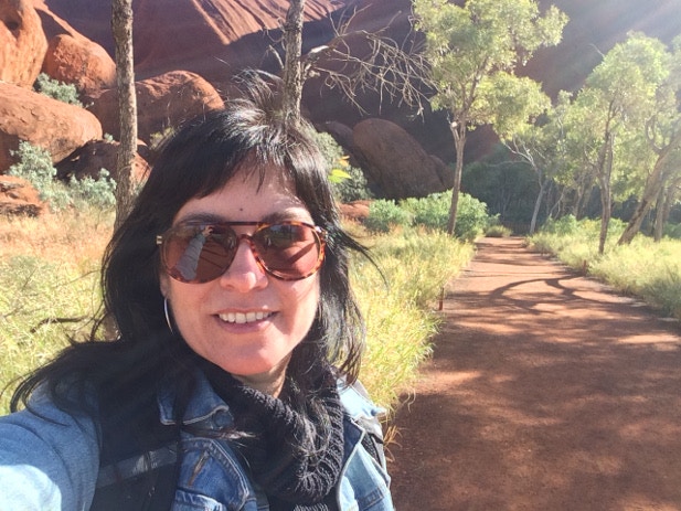 Tasmin on her self-guided stroll around the base of Uluru