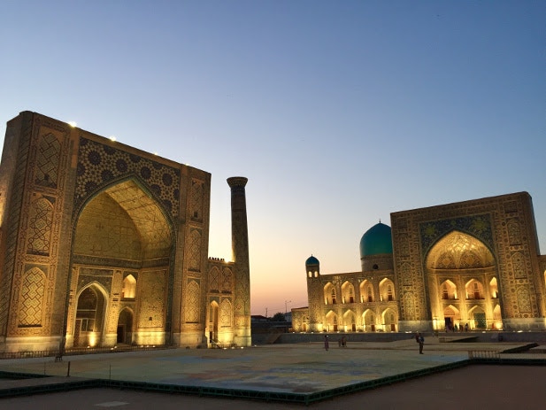 Dusk over an illuminated Registran Squaer, Uzbekistan
