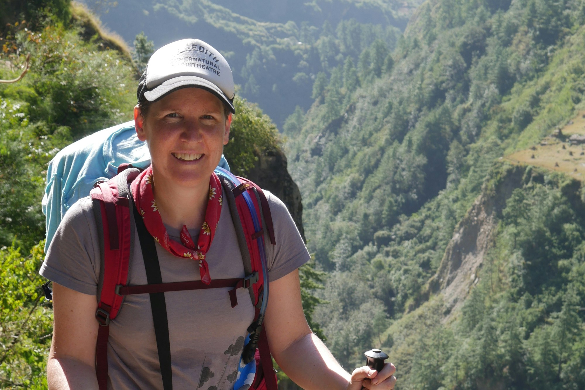 Angela against a stunning forested Himalayan backdrop