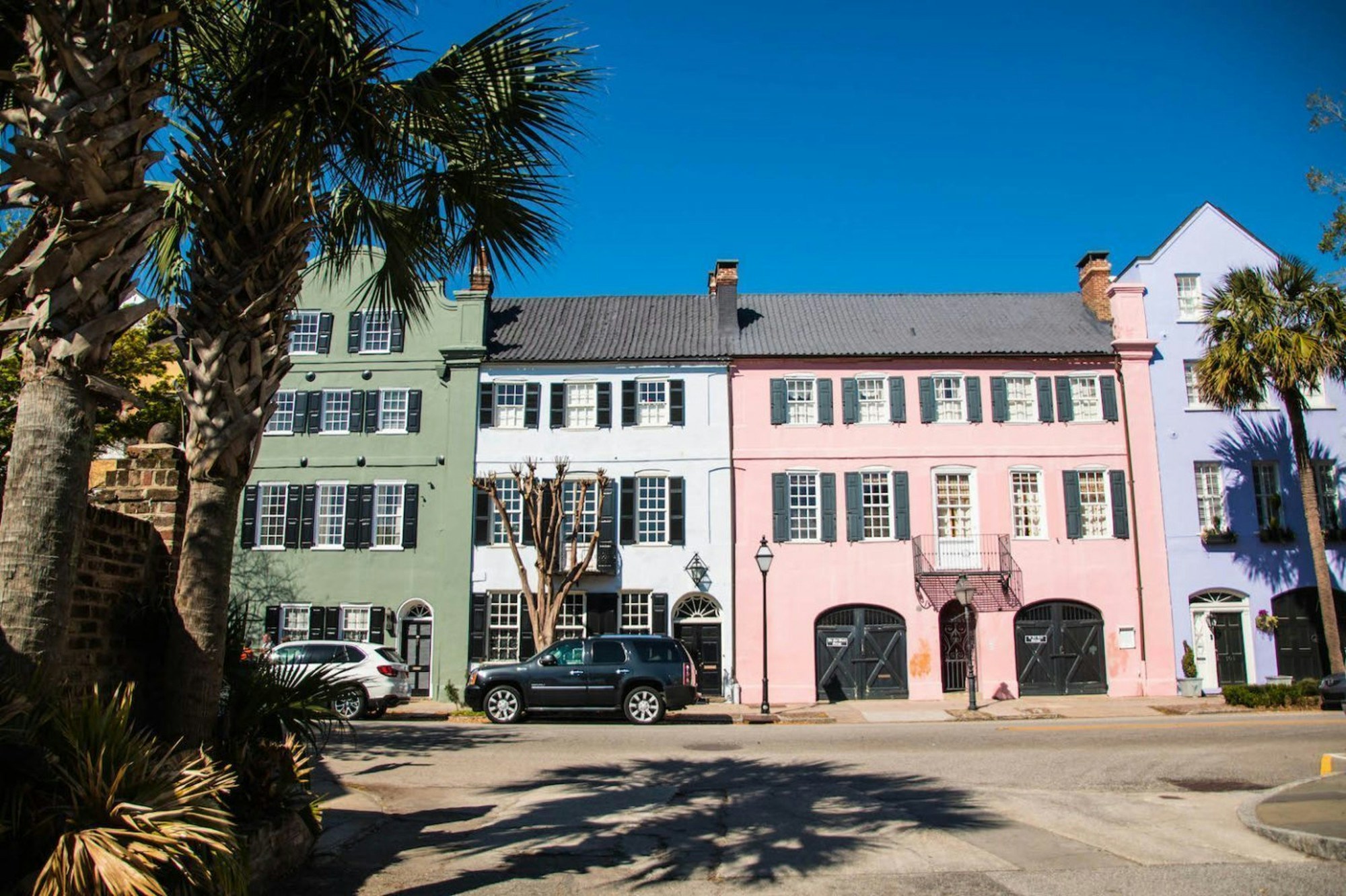 Exploring the colourful houses of Charleston's Rainbow Road © Holly Habeck