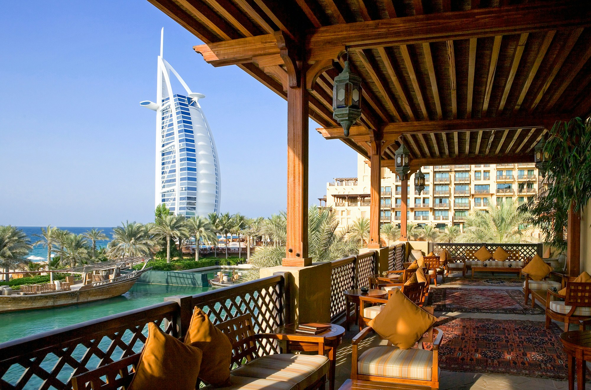 The open-air restaurant of the Madinat Jumeirah resort, in the background the Burj al Arab tower