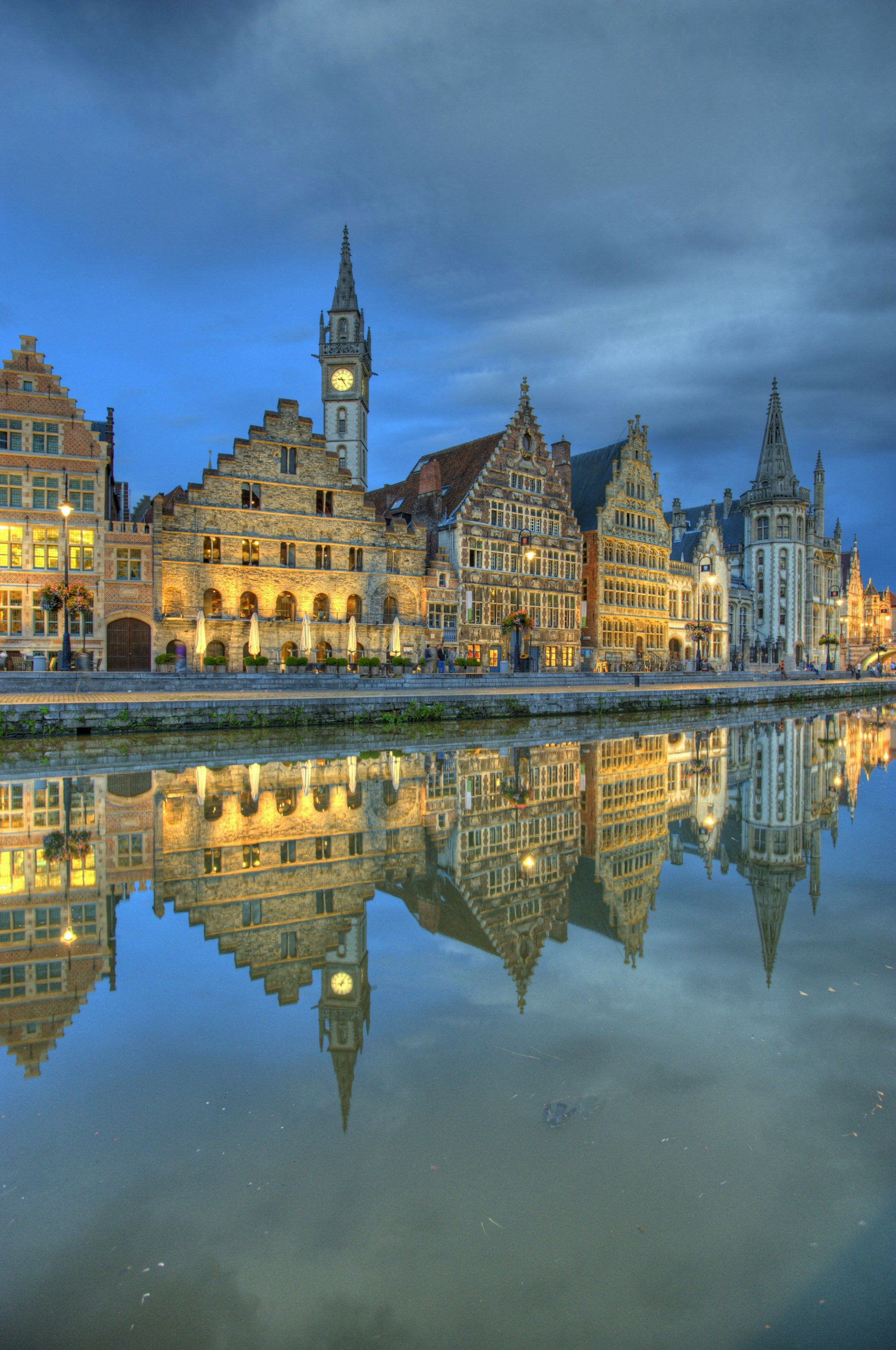 Houses along Graslei reflected in the canal