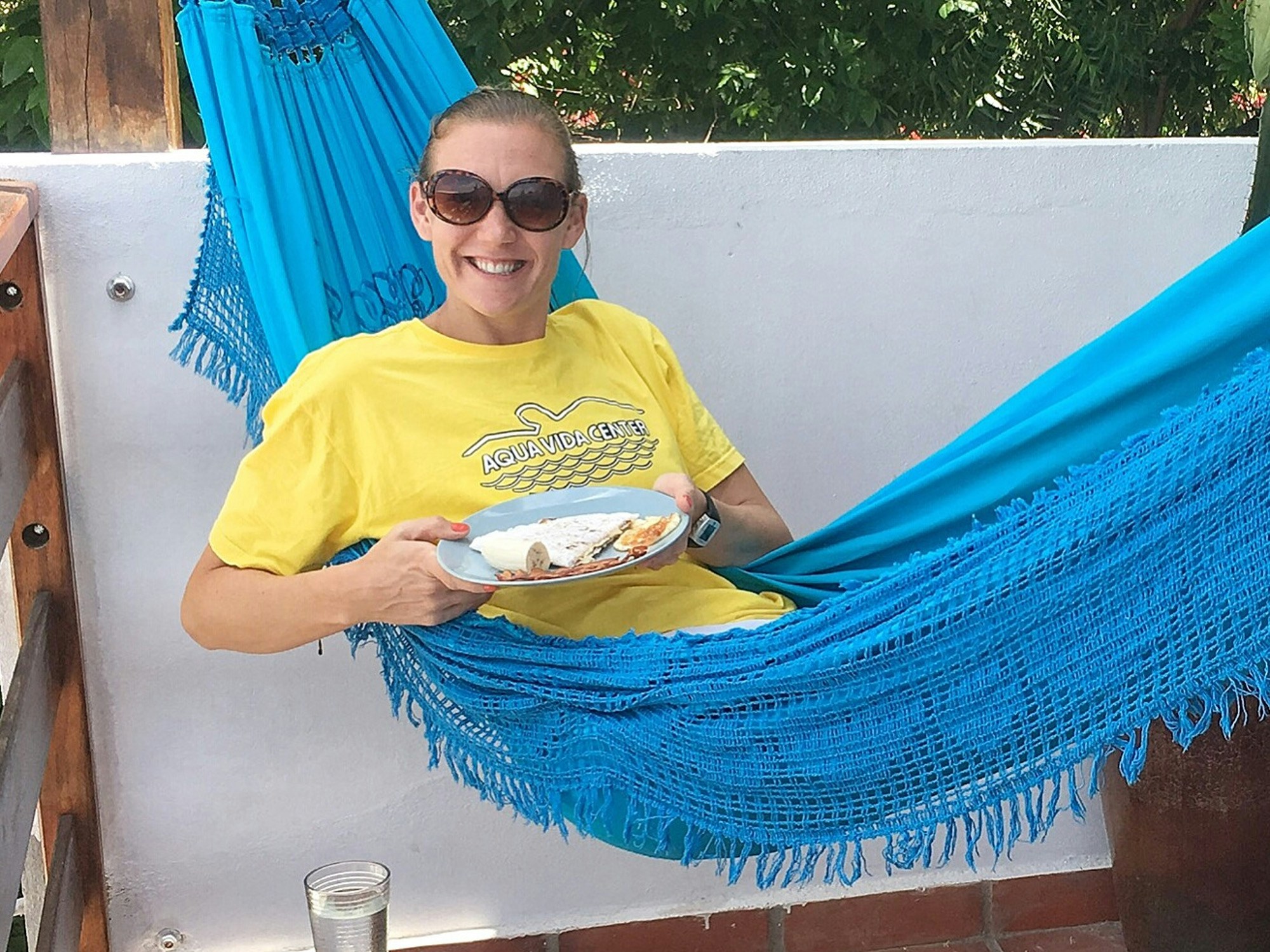 Carrie tucking into tapioca crepes in Brazil © Carrie Veatch