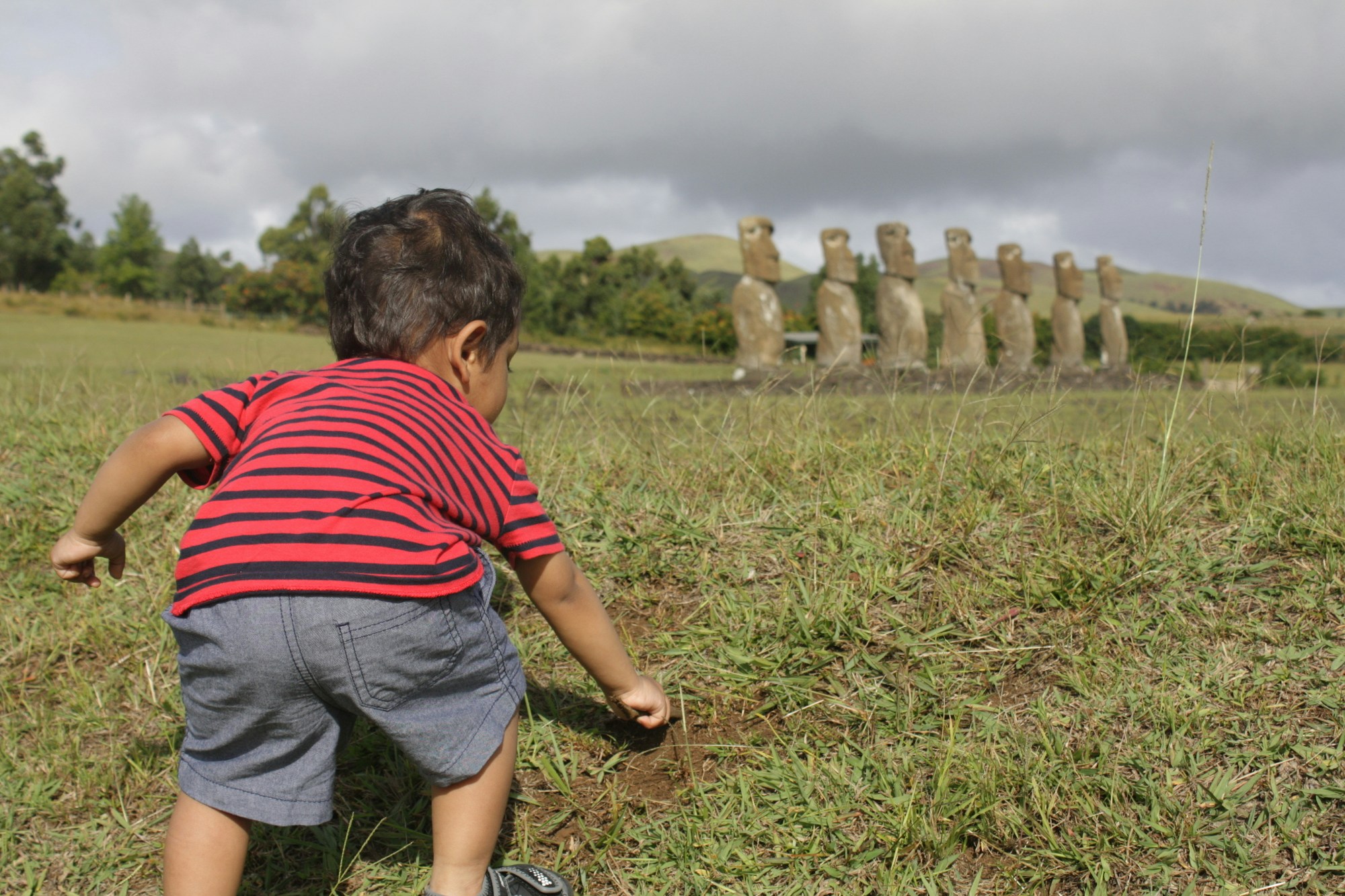 Samai's son trying to dig up more Moai on Easter Island